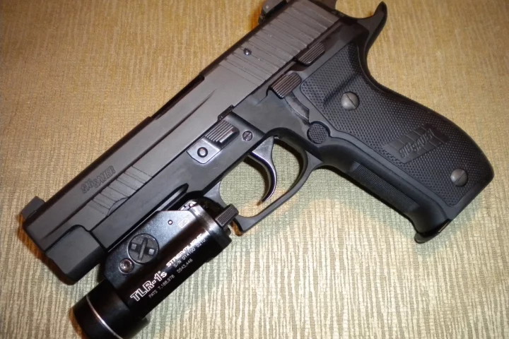 Sig Sauer M11 with TLR-1 flashlight attached