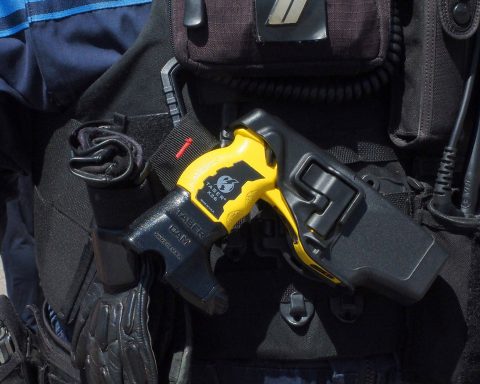 Taser x26 on police officers belt