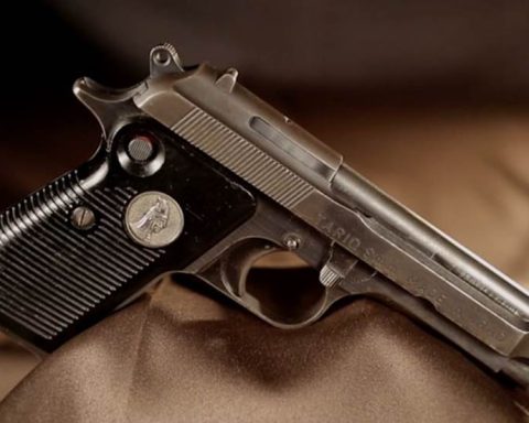 A Tariq 9mm pistol on a brown background